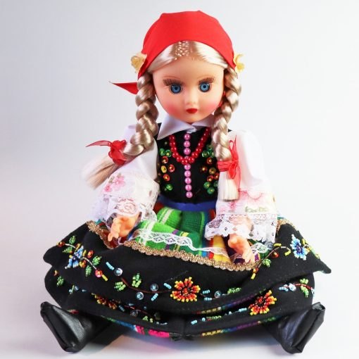 The doll is dressed in the original Łowicz woolen