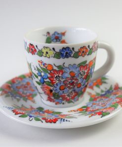 A coffee cup with an Opole folk pattern